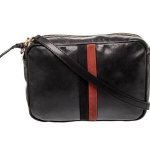 Chic Black Crossbody Bag with Red Accent